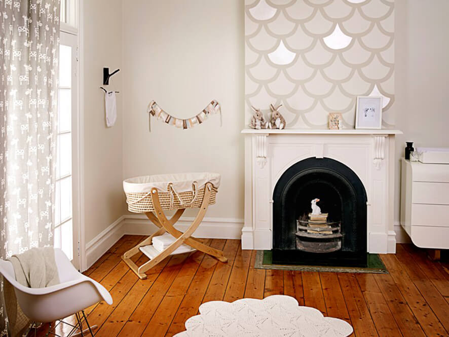 Timber_themed_natural_nursery_cane_cot_fireplace_rug_white__giraffe_curtains_fish_scale_artwork